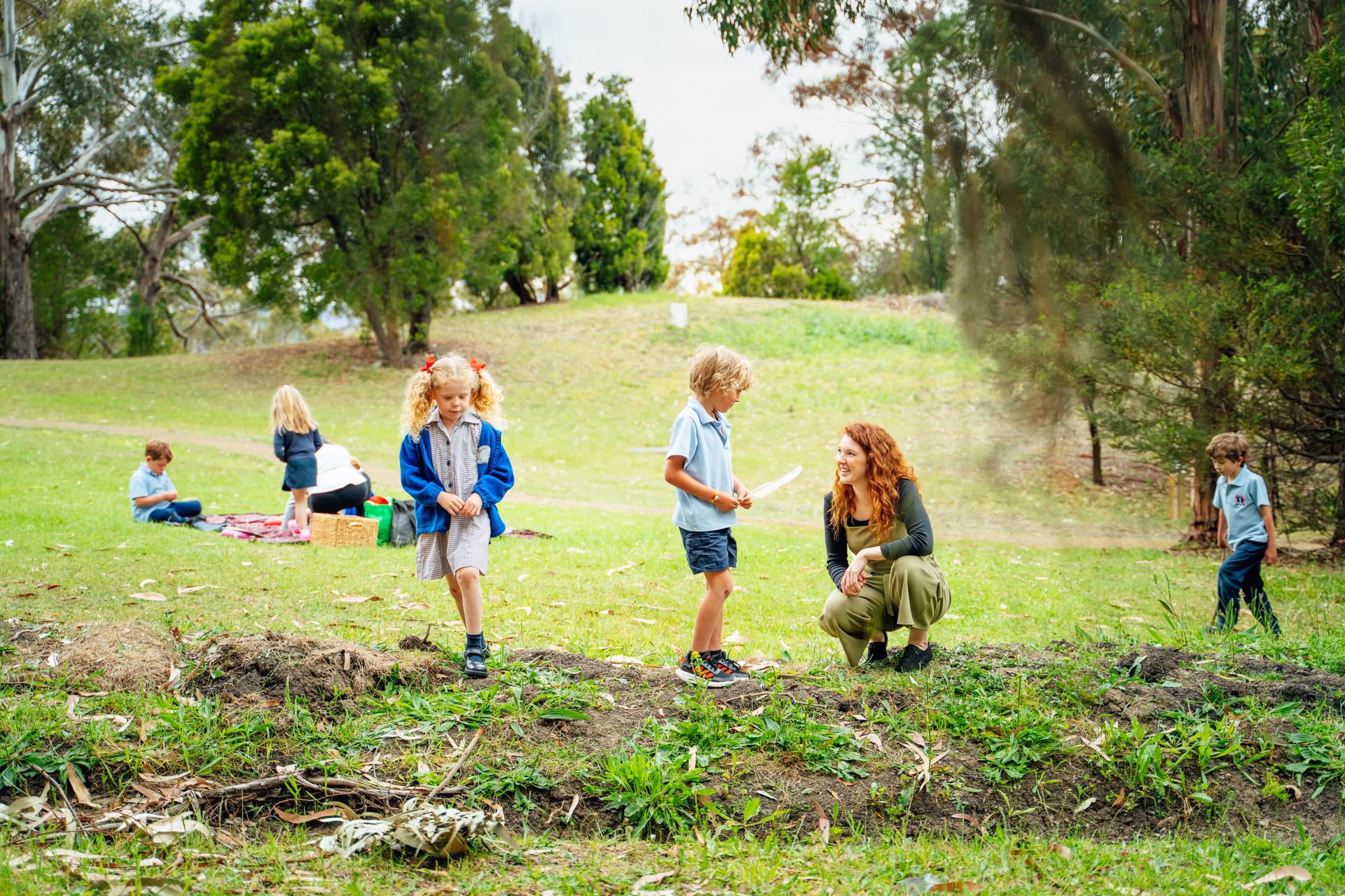 School students learning outdoors