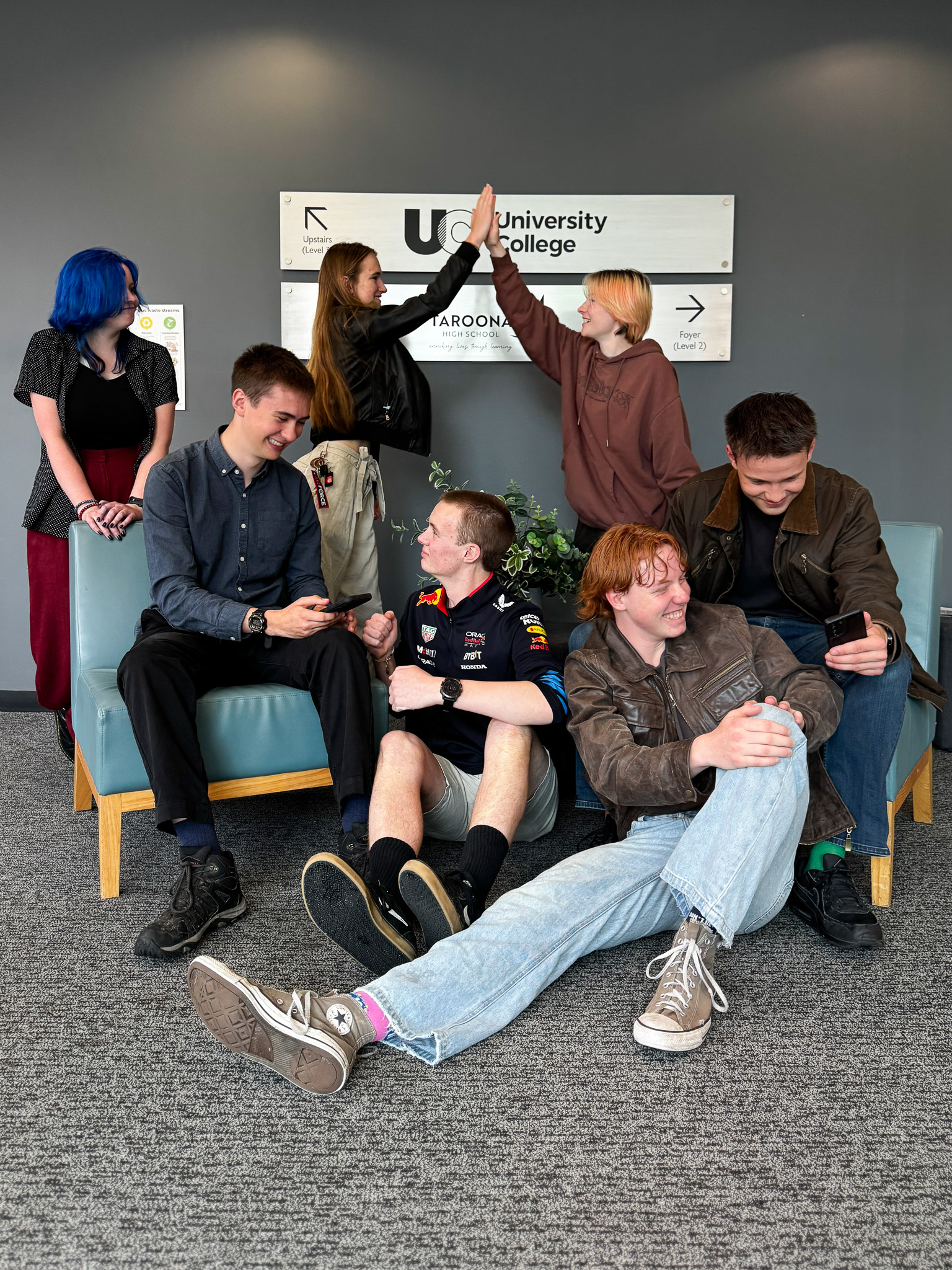 Taroona High School year 12 students celebrate as they receive their ATAR scores.